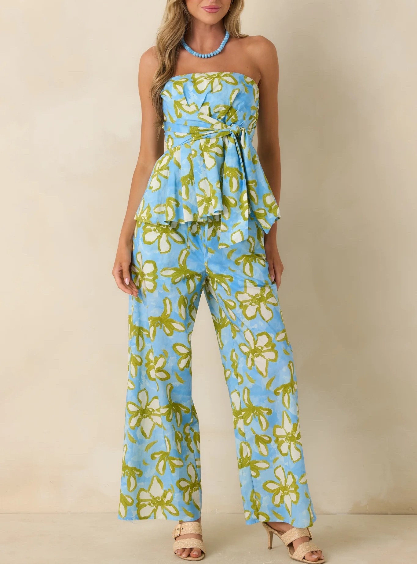 Inspired by retro floral femininity, the Flower Power Move Blue Floral Cotton Peplum Top brings a playful yet polished silhouette to your warm-weather wardrobe. The peplum waist adds soft structure while the bold blue floral print keeps the look fresh, expressive, and full of personality. Style the look with a pair of matching trousers. Top: Under $60; Trousers: Under $60.

Keywords:

* blue floral peplum top
* cotton peplum top
* floral summer top
* boho floral top
* statement peplum blouse
* two piece outfits women 
* summer blouse
* feminine fashion top
* brunch outfit top
* casual chic top
* retro floral top
* breathable cotton top
* vacation outfit top
* garden party top
* romantic floral blouse
* summer outfits women 
* peplum blouse
* feminine summer style
* colorful floral top
* stylish casual top

#LTKootd #LTKgrwm #LTKTravel