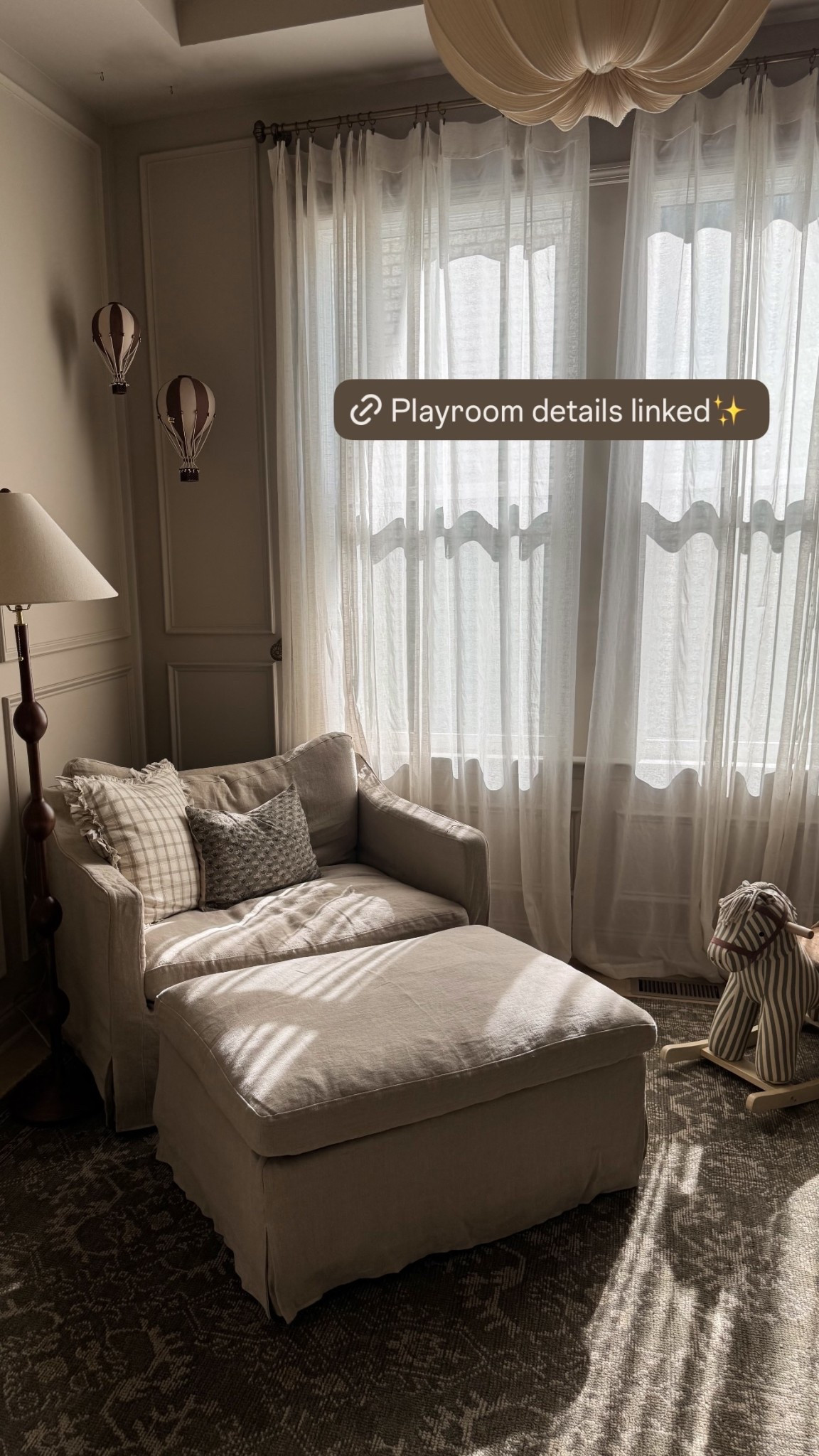 Playroom for baby boy 🤍🥹 

Wall color: Stone Hearth by Benjamin Moore 

Light fixture is Aurelia Vintage Fabric Pendant Lamp from Letslighting.. pretty sure it’s a dupe for $$$ one but it came out cute! Just took 6 weeks. 

The honey pot, hot air balloons & some toys are from Odin & Parker but couldn’t link below. Chair is the Amelia chair & ottoman in color Oat Flour. 

Diaper caddy is HAPP Brand in beige 

#LTKHome #LTKBaby