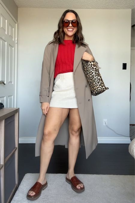 Spring weekend outfit! Details below:

-Reformation red knit sweater tank. I have a medium. 
-Dissh beige linen skort, I have a size 8. 
-Oak + Fort oversized trench coat in the colour brindle. I have a medium. 
-Ganni leopard print tote bag. 
-Brown aviator sunglasses. 
-Brown slide sandals. 


#LTKSeasonal #LTKstyletip #LTKfindsunder100