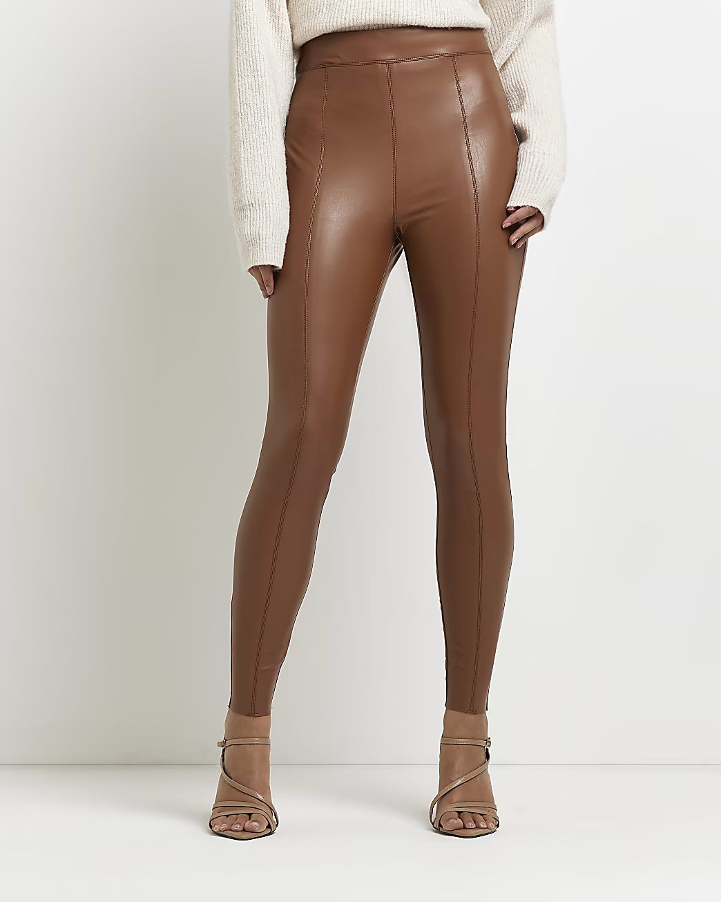 Brown faux leather skinny trousers | River Island (US)