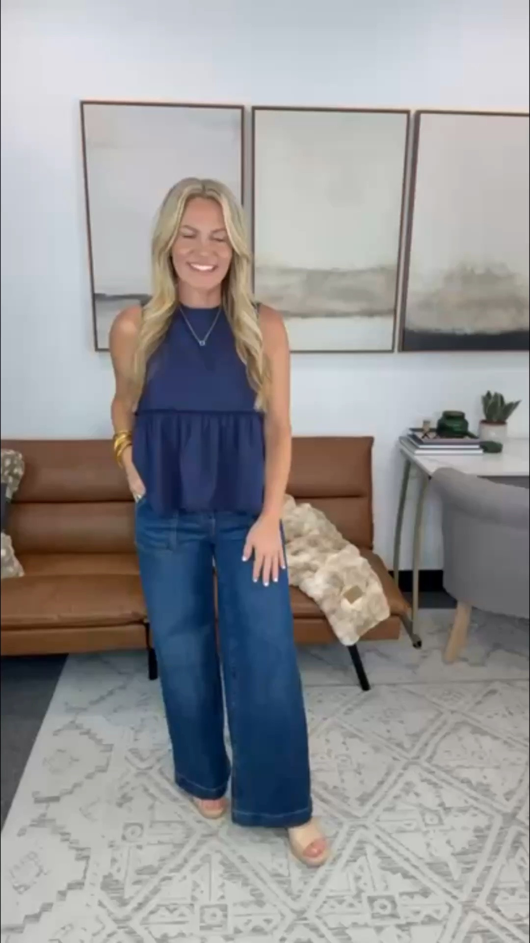 I almost skipped this top because I wasn’t sure how the babydoll shape would look with jeans, but it ended up being one of my favorite combinations. The flowy fit keeps it cool on hot days, and pairing it with darker wide-leg denim gives it just enough structure so it feels balanced instead of oversized.

Navy babydoll top, wide leg jeans, dark wash denim, casual outfit, everyday style, teacher outfit, office casual, transitional fashion, fall outfit inspiration, AudrieDollins

#LTKSeasonal #LTKOver40 #LTKootd