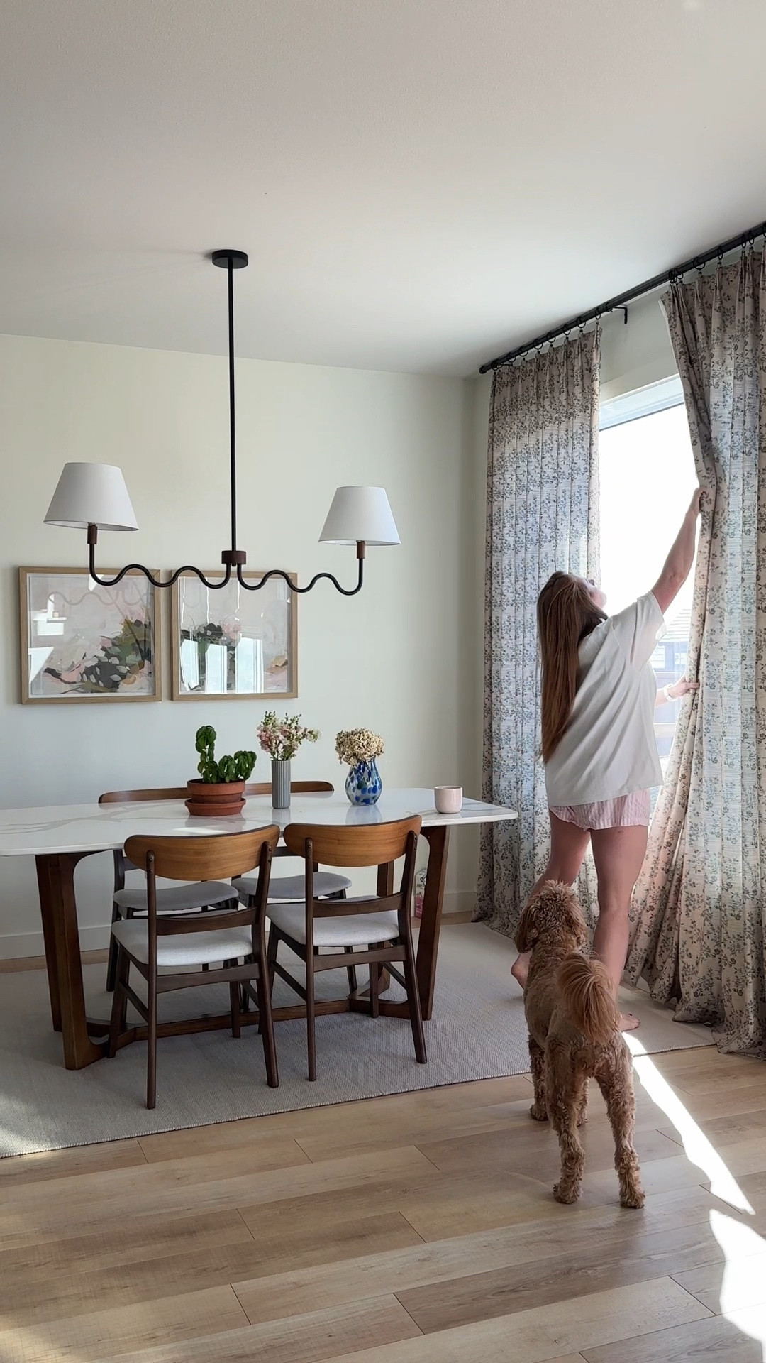 ✨ Slow morning ritual ✨ Opening the floral curtains (linked from +Two Pages) and letting the light in makes my space feel so fresh and calm. I’ve been living in this oversized white tee from +Aerie Premium and these pink striped poplin shorts—so soft and easy for summer mornings at home. Paired with my favourite Fable mug for coffee, and a peek at our dining room table, chairs, and light in the background (all linked here). Cozy, minimal, and mood-boosting.

oversized white tshirt Aerie, poplin shorts women, floral curtains Two Pages, Fable mug, dining room table and chairs, cozy summer morning outfit, casual loungewear



#LTKcasa #LTKcanada #LTKsummer