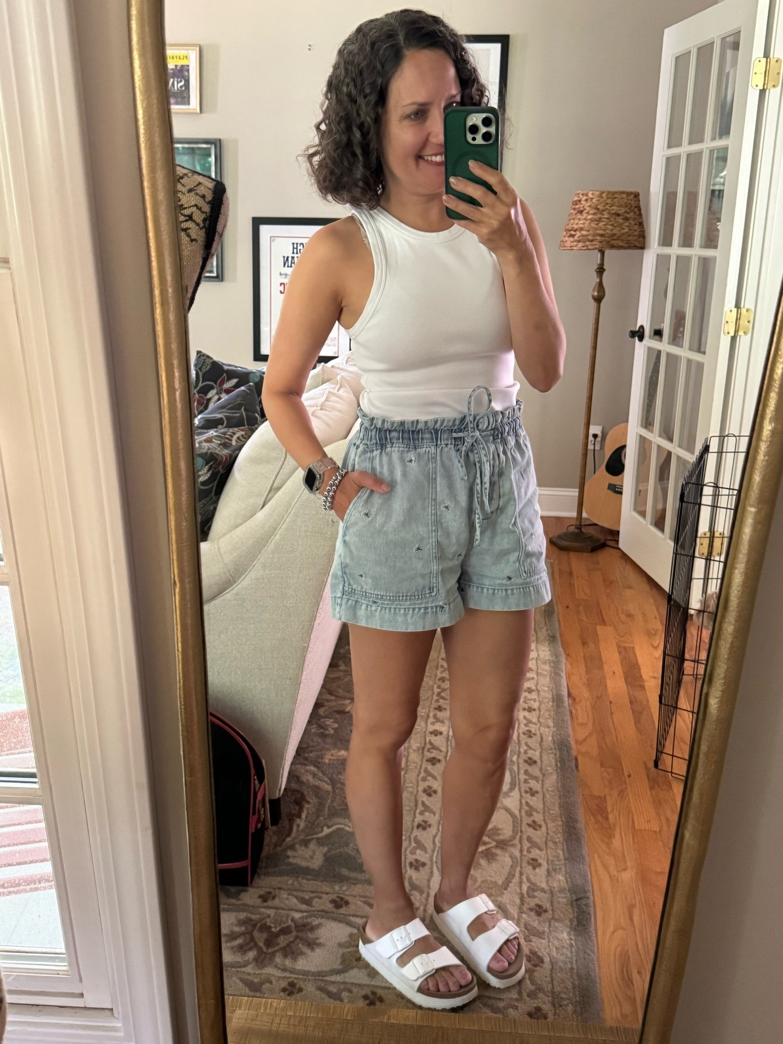 Hot summer day mom on the go outfit ~ tank from Nordstrom, floral Jean shorts are Rails, Birkenstock sandals.

#LTKdayinmylife #LTKmomlife #LTKOver40