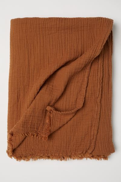 Throw in woven, crinkled cotton fabric. | H&M (US + CA)