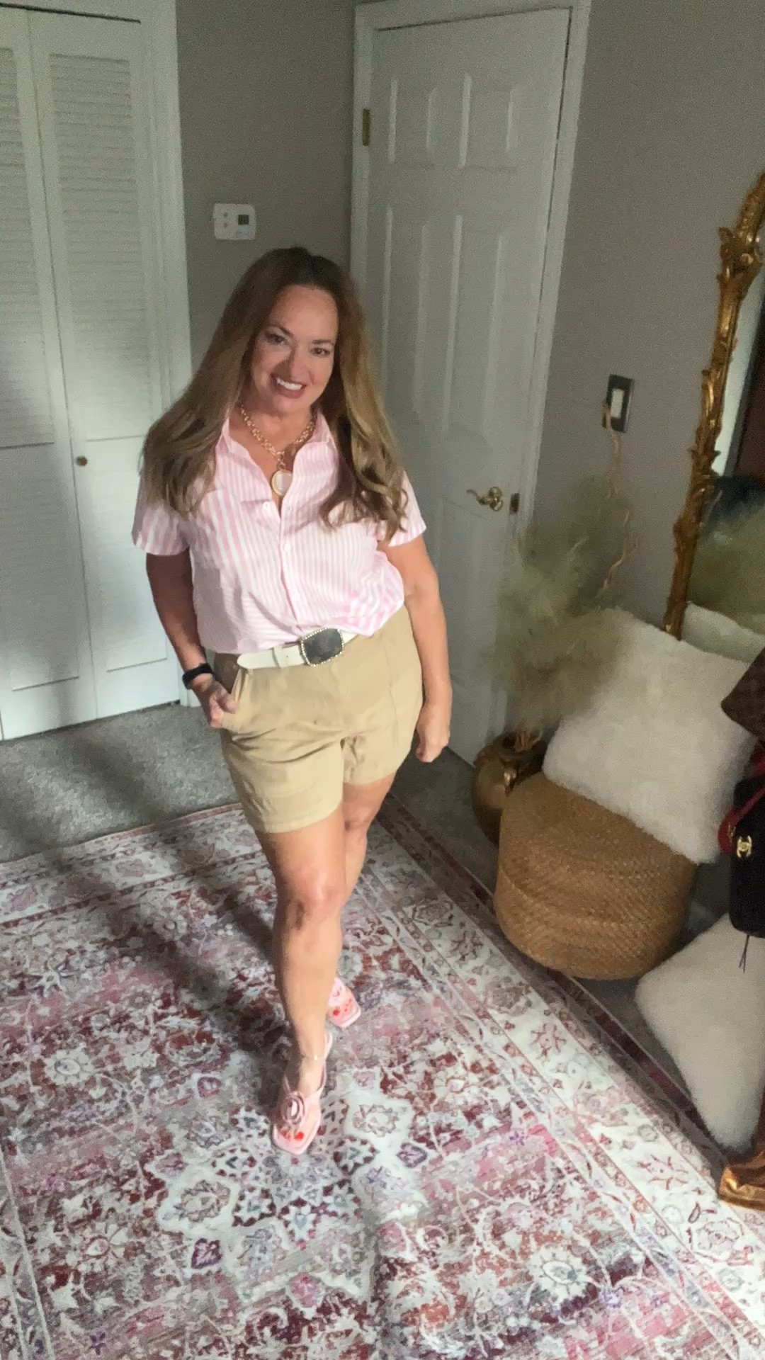 Cutest pinstripe blouse with asymmetrical stripes.

#LTKWorkwear #LTKOver40 #LTKgrwm