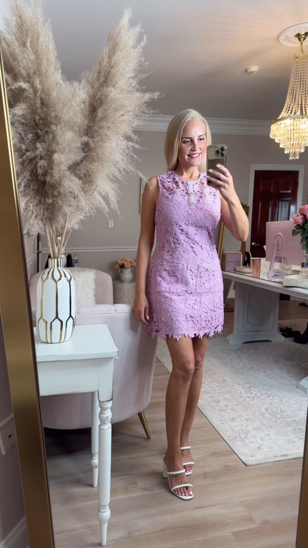 This lilac shift dress has a beautiful floral appliqué fabric and sparkly rhinestone buttons that look expensive. I tried it on later with a belt and it looked even better that way on my hourglass figure. Gorgeous dress and so high-quality. Wearing a size medium. It's a little loose everywhere other than the bust. May fit someone with less curves better works great for me with the belt. Online it says the color is pink, but in person, it is more of a pale purple. ￼

#LTKgrwm #LTKootd #LTKdayinmylife