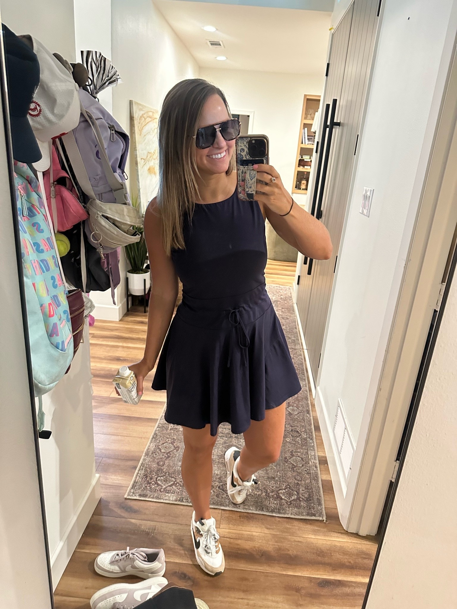 Errands and travel outfit 💫 to LTK conference! Love a good tennis dress with built in biker shorts. Easy to throw on and go!

#LTKCon #LTKootd #LTKgrwm