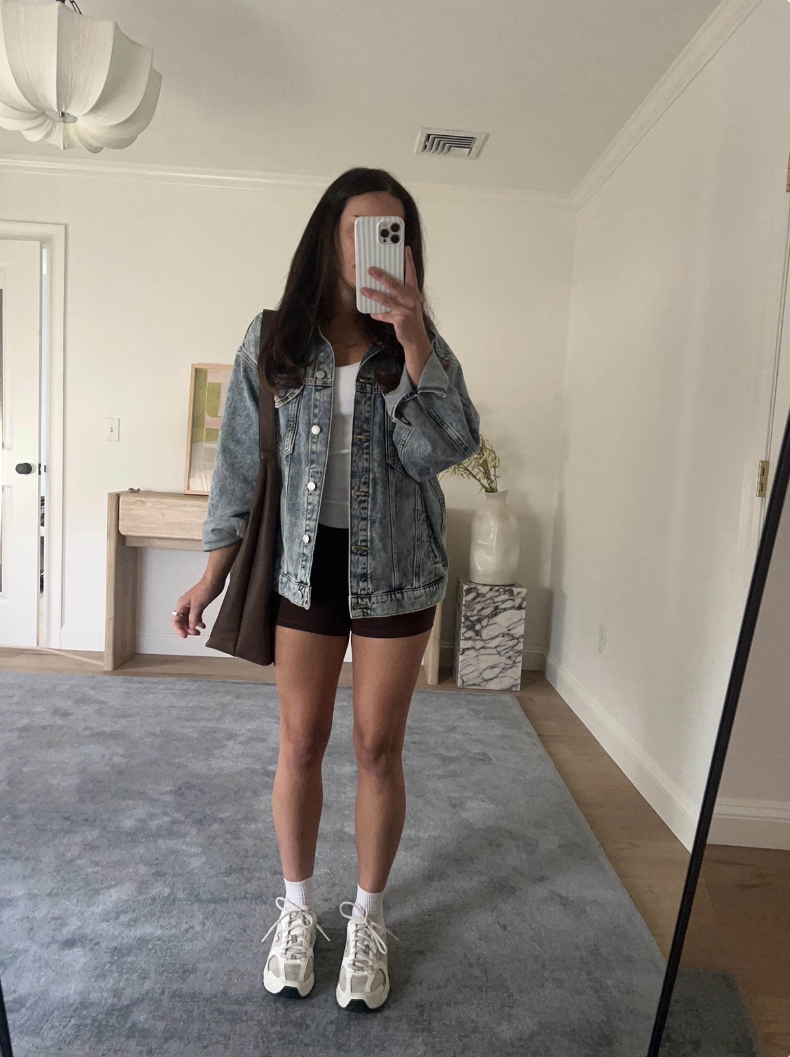 Casual early fall outfit! wearing XS in this denim jacket, XS in brown biker shorts, XS in tank 

 #LTKSeasonal