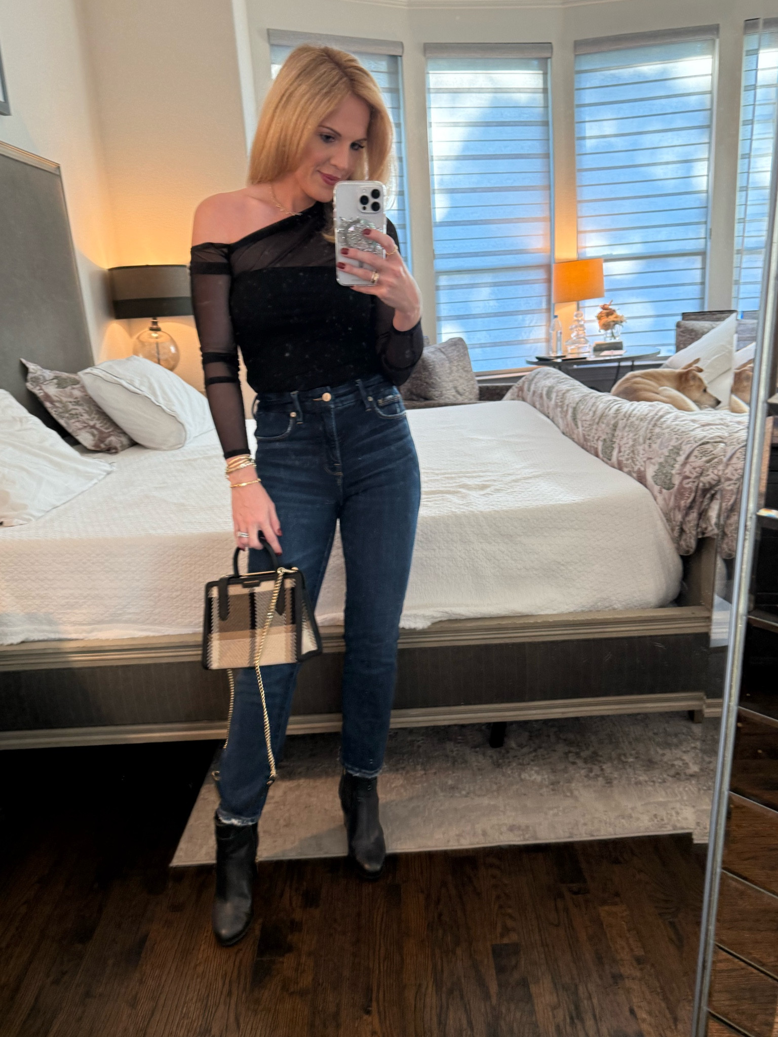 Date night look 
Fall look 
Black mesh top 
Abercrombie and fitch 
Good American straight leg jeans 
Heeled booties 
Fall bag 
Strathberry bag 
Plaid leather bag 

#LTKFindsUnder100 #LTKSeasonal #LTKItBag