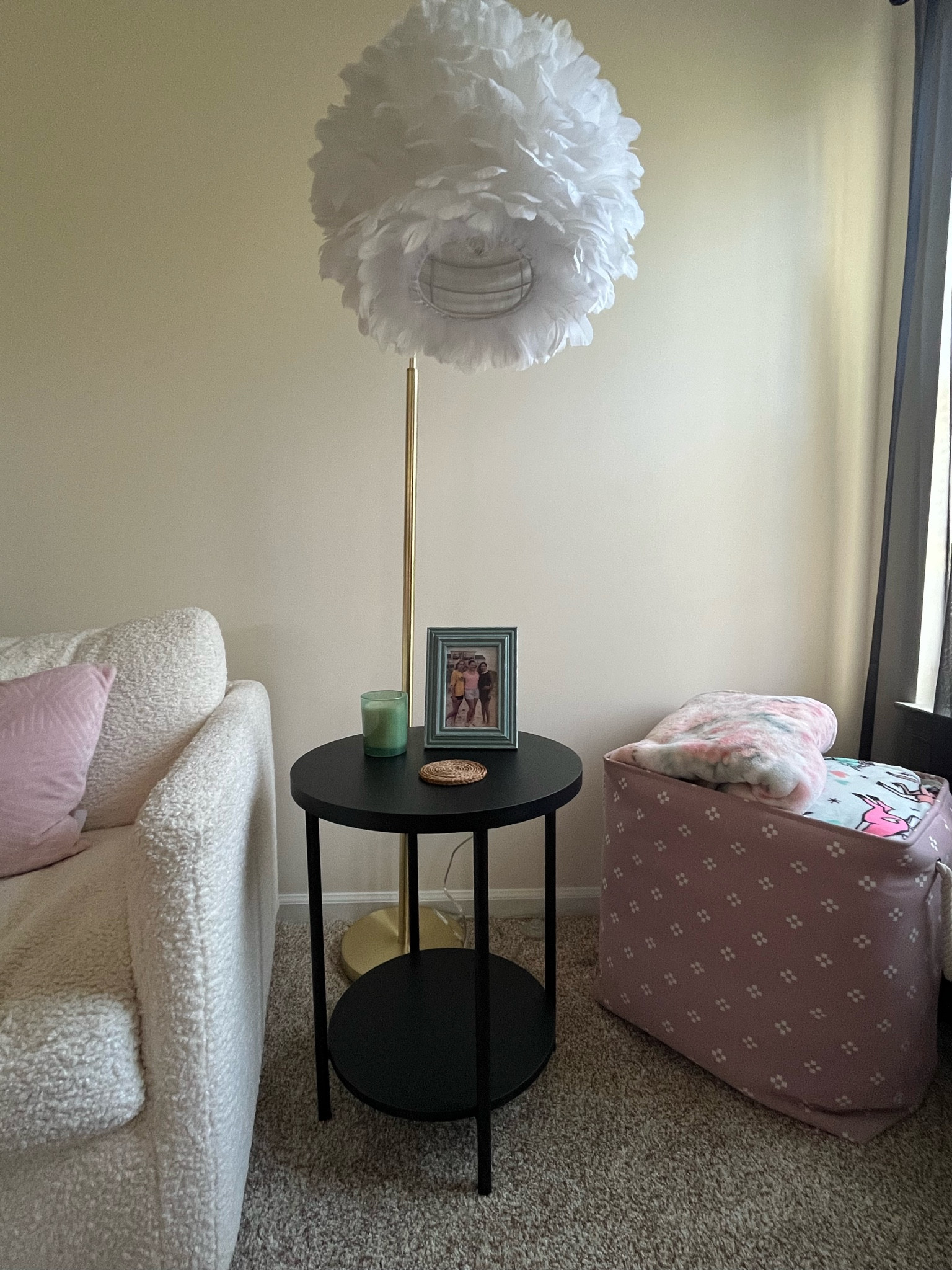 Living room end table
Chair was on clearance from homegoods 
Pink bin from homegoods 
Blankets from kohls 

#LTKhome #LTKunder100 #LTKsalealert