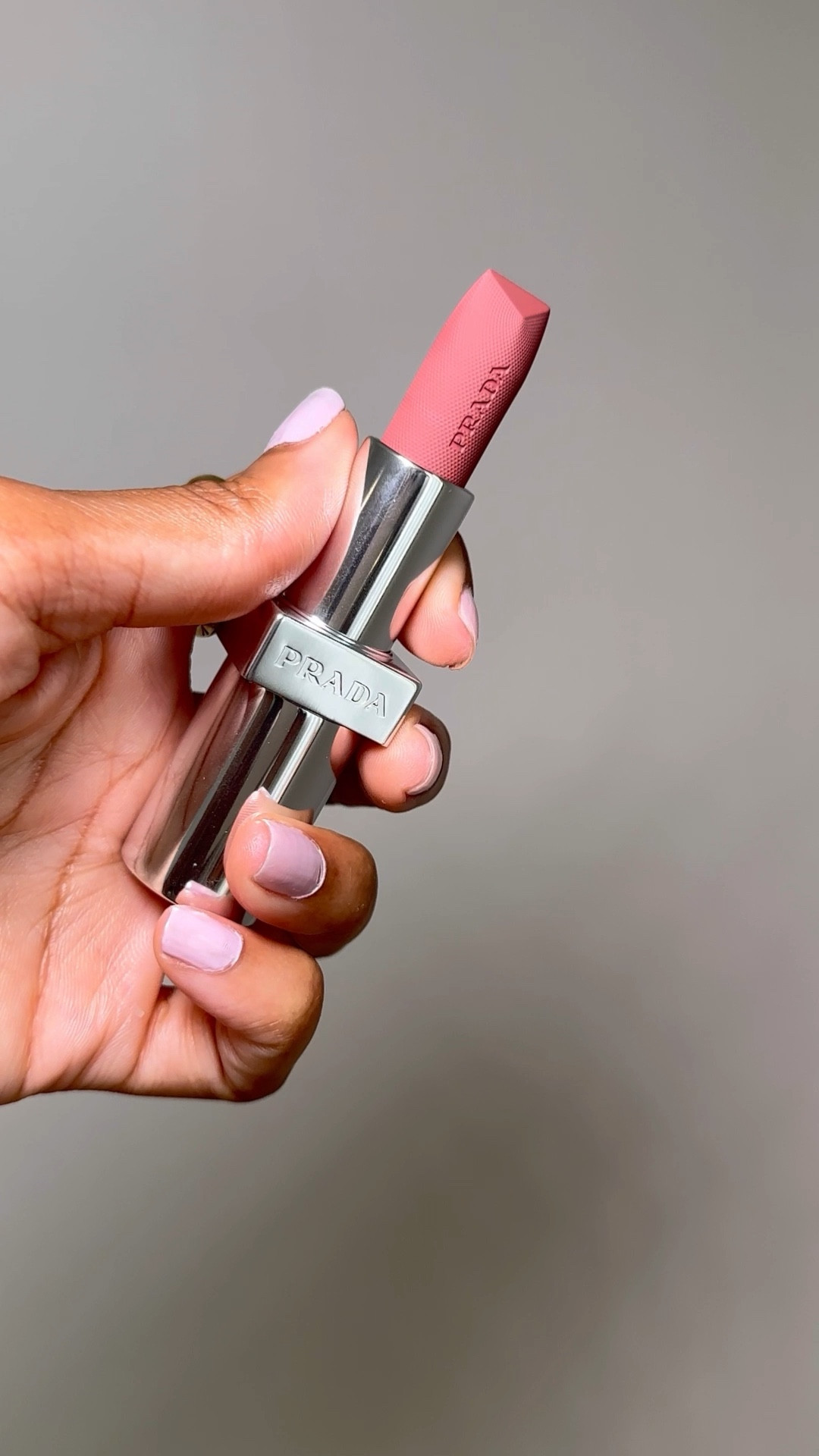 Prada Monochrome Soft Matte reveals soft, diffused colors that recall the luminosity and versatility of Prada's iconic Re-Nylon fabric. This lipstick provides visible and durable care with overtime use while creating high color adhesion through an imperceptible texture that fuses in contact with the lips.
The triangle-shaped bullet ensures effortless application through easy control and definition, delivering adjustable, buildable coverage with a sophisticated finish. #prada #pradabeauty #pradalipstick

#LTKBeauty #LTKFindsUnder100