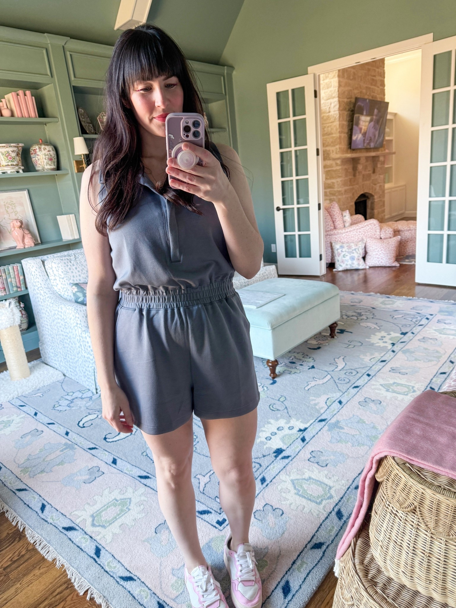 Charcoal gray jumpsuit, pink sneakers 

#HOCWinter 

#LTKOver40 #LTKSaleAlert