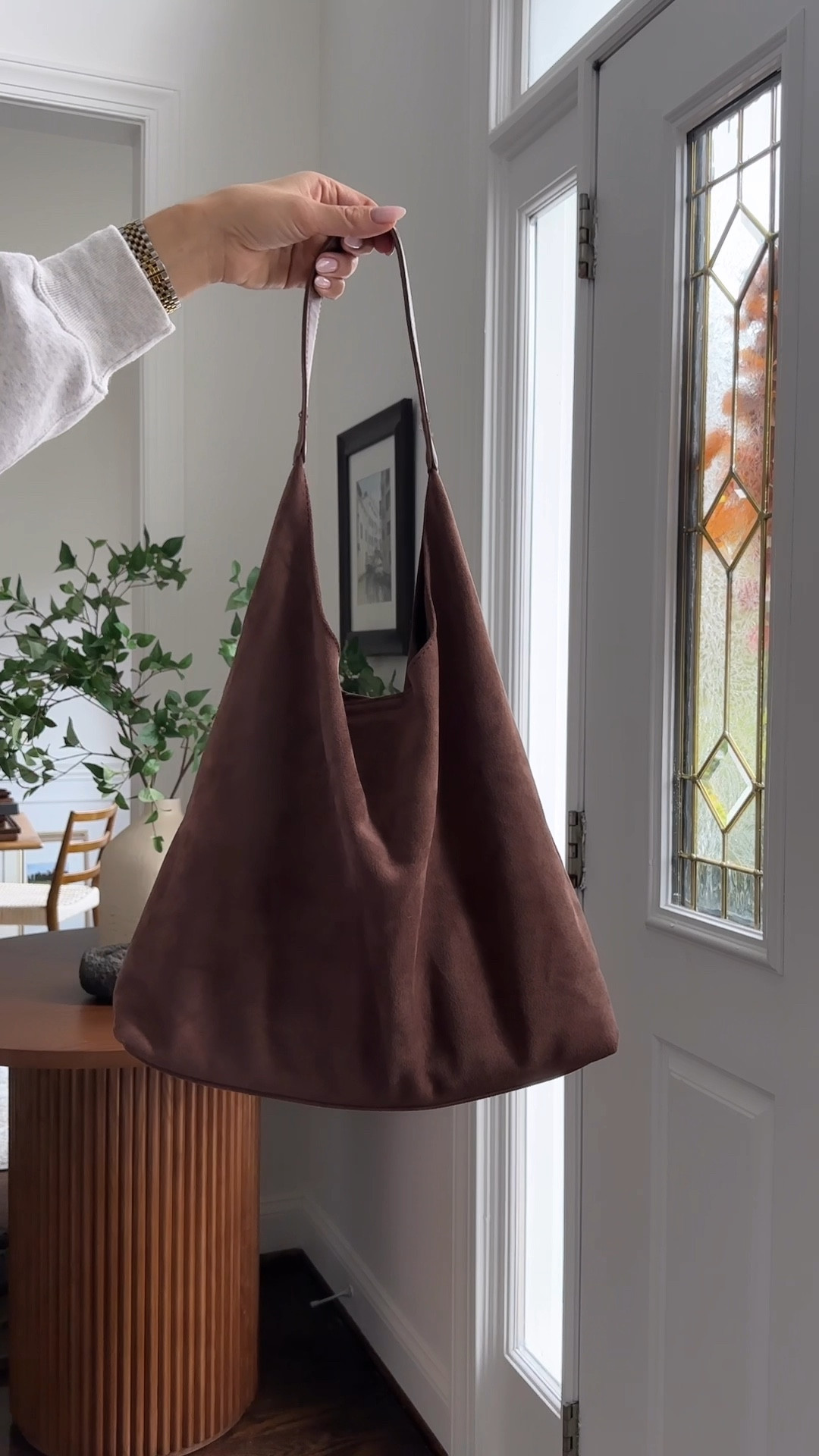 Especially since it’s under $30 ✨ Oversized brown suede purses are definitely trending this season, but the price tag on most of them I just personally can’t get behind.

If it was for a work bag - completely different story! But if I’m wearing a larger purse these days, it’s typically because I’m with the boys - so snacks, water bottles, tablets, toys, coloring books, portable potties 🙃… you get where I’m going with this…  I needed a bag that if it got ruined it wouldn’t cry lol. THIS IS THAT BAG!

Quality is great! Just not necessarily something to write home about. The style and color are PERFECT for making any basic outfit feel a little more trendy and elevated, and therefor putting a little pep in my step ✨ So for what I was looking for, 10/10 happy with this purchase!! 

#ltk #ltkfashion #wearablefashion #momstylelife #fashiontrends #easytowear #momstyleblogger 

#LTKFindsUnder50 #LTKStyleTip