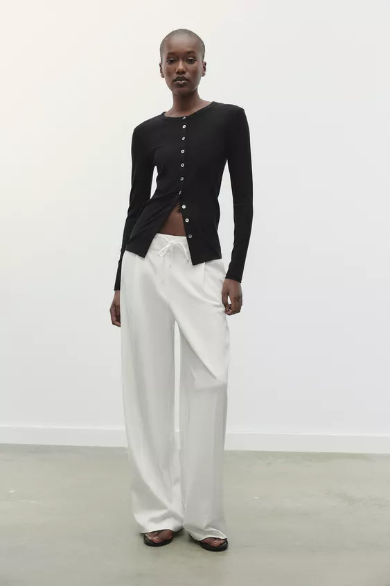 Pants with an adjustable double high elastic waistband with drawstring and matching fabric. Front... | Zara US