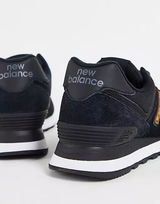 New Balance 574 sneakers in black and leopard print | ASOS (Global)
