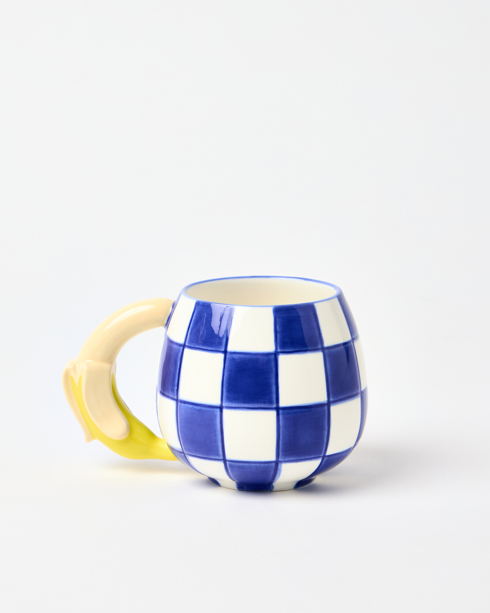 Banana Blue Chequerboard Ceramic Mug | Oliver Bonas (Global)