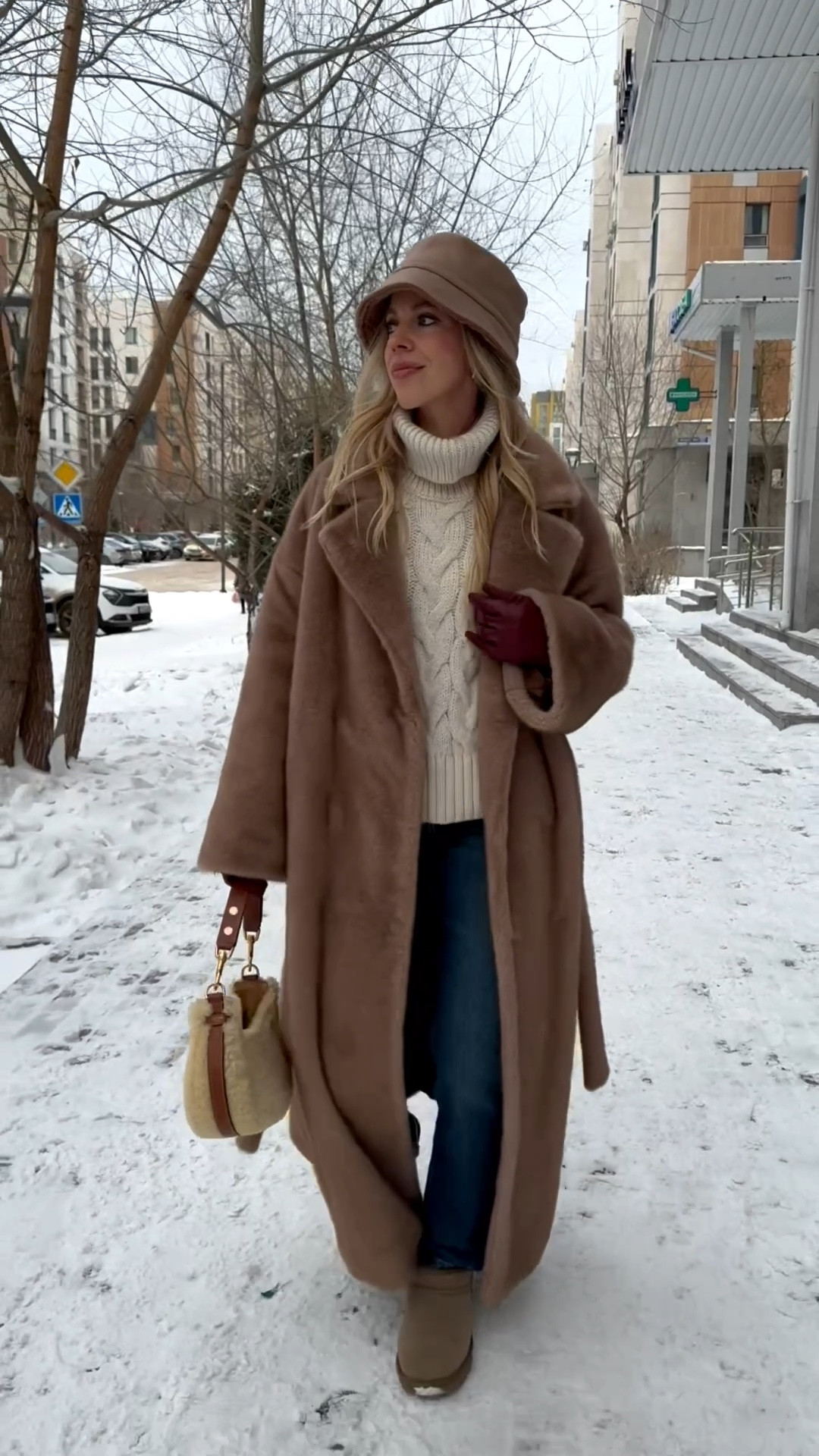 Camel beige fur coat, cozy winter outfit, cable knit sweater, Zara mom jeans (these are perfect with Ugg mini boots and under $50!)

#LTKOver40 #LTKSeasonal #LTKFindsUnder50