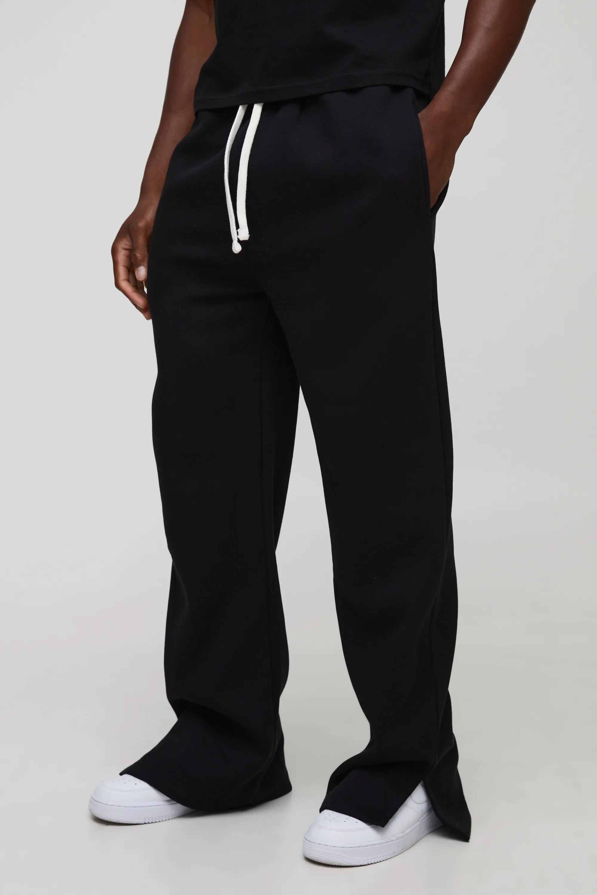 Relaxed Fit Flared Split Hem Sweatpants | boohooMAN (US & Canada)