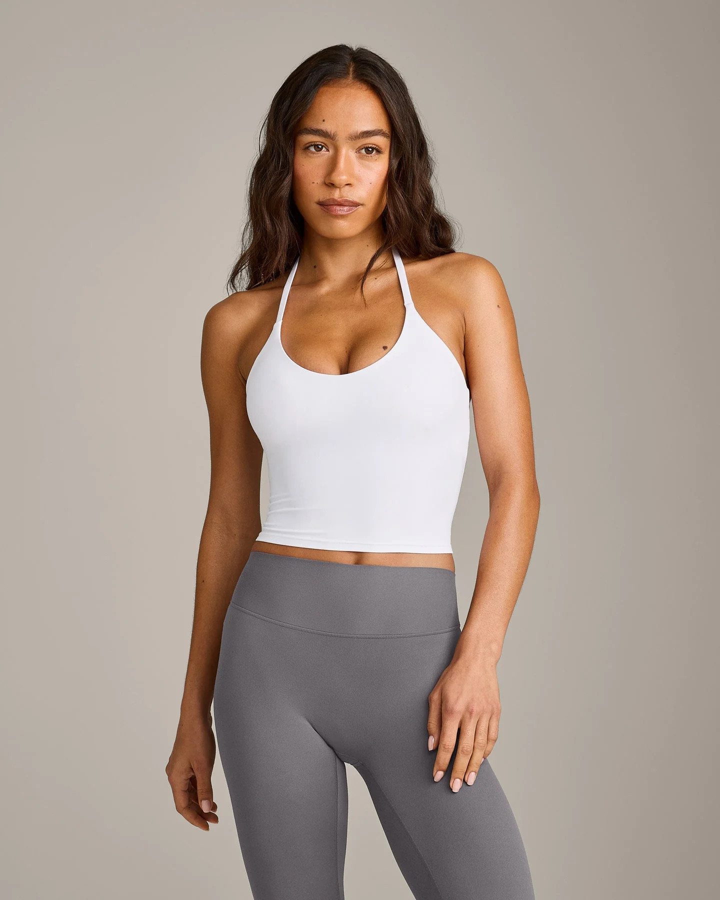 SoftMotion\u2122 Strappy Halter Neck Mid Tank Top with Built in Bra Shelf with Gray Logo 
 White | Oner Active (UK / US)