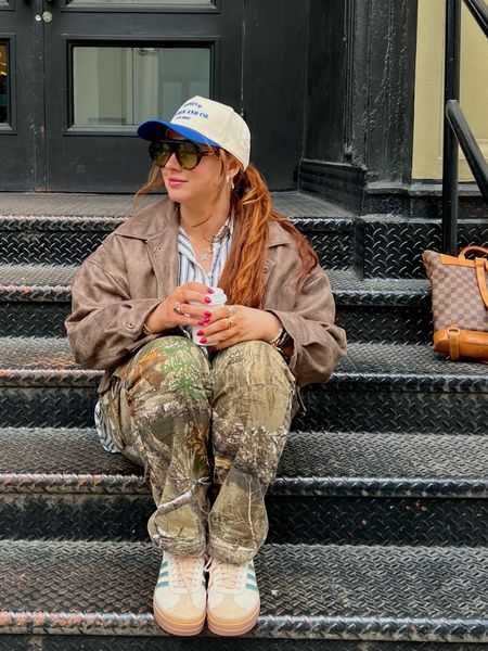 Really into styling camo pants lately. I love the mix of masculine and feminine looks with it. Camo is also perfect for pattern mixing too, you can lean into bright colors or earth tones 

Wearing a large in the button down, medium in pants, and size 6 in jacket 

Spring outfit, camo pants styled, street style, summer outfit, travel outfit 

#LTKstyletip