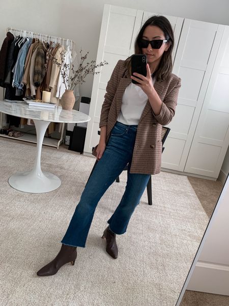 J.Crew Stevie ankle boot. These are so chic and comfy. Super low heel, so easy to walk-in and comfy. I would go up a half size. 

Blazer - Lioness xs (old)
Tee - Everlane medium
Jeans - Mother 24
Boots - J.crew 5