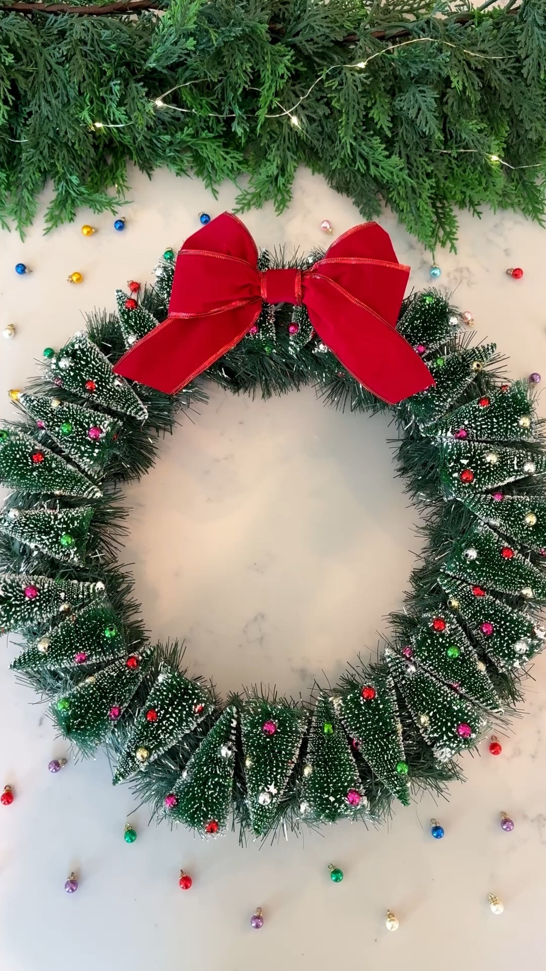 DIY Bottle Brush Wreath! #christmasdiy #diychristmas 

#LTKHoliday #LTKHome #LTKSeasonal
