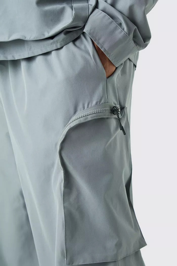 Plus Technical Stretch Elasticated Waist Zip Cargo Trouser | boohoo (US & Canada)