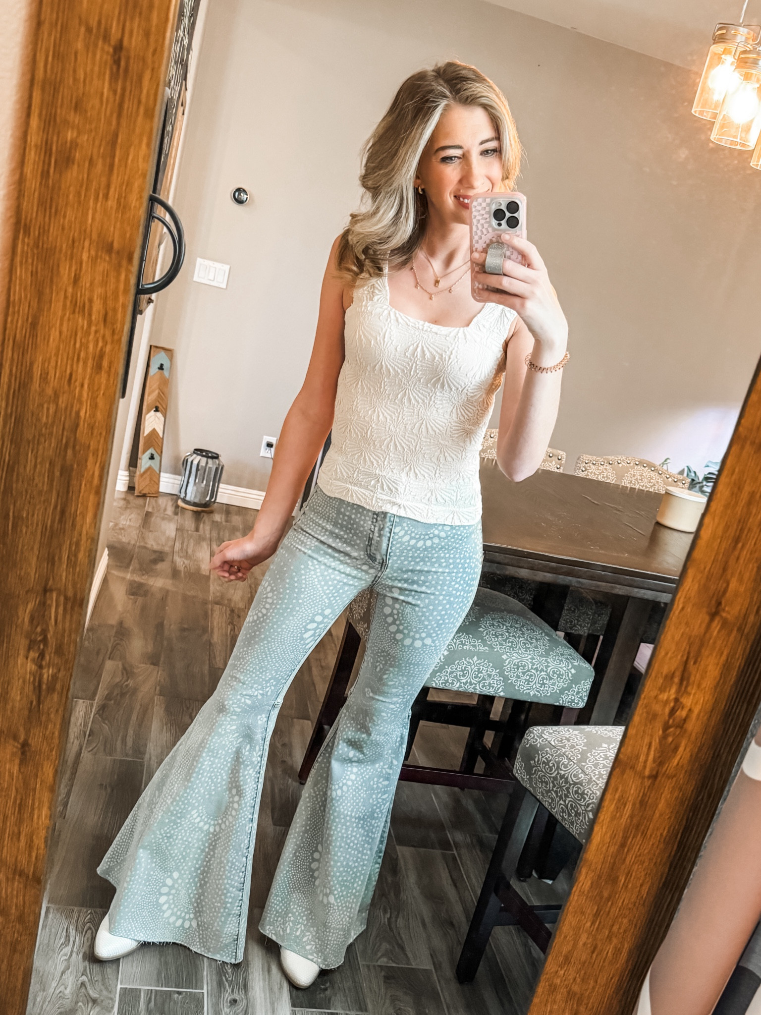These wide flare jeans are perfect for a country music concert or trip to Nashville!! So comfy! 

I’m wearing a size 25 

#LTKFestival #LTKFindsUnder100 #LTKStyleTip