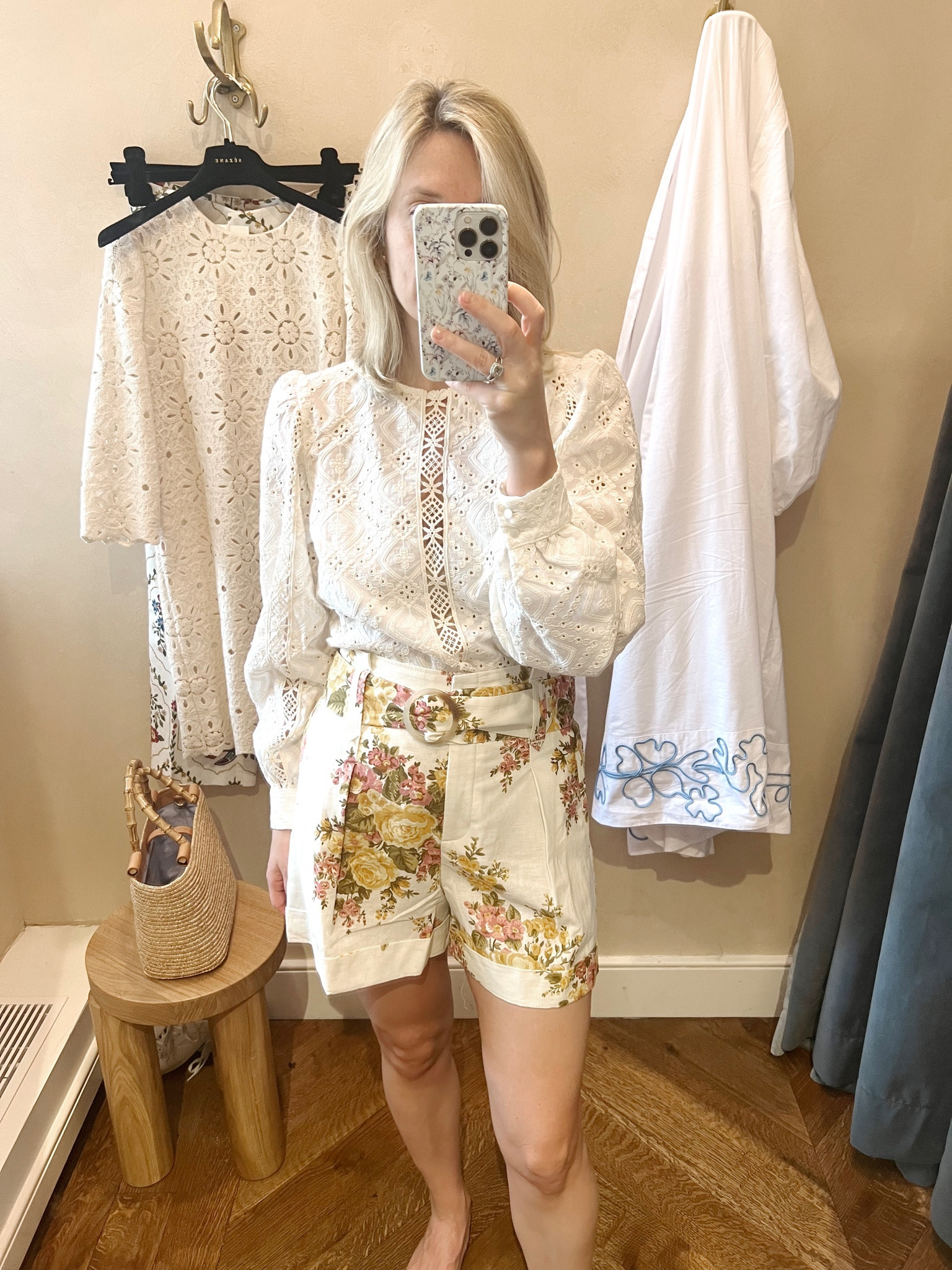 Floral print high waist shorts with a belt. White lace long sleeve blouse. Summer outfit. Wearing a size 4 in the shorts and a size 2 in the top
.
.
.
.
… 

#LTKSeasonal #LTKstyletip #LTKtravel