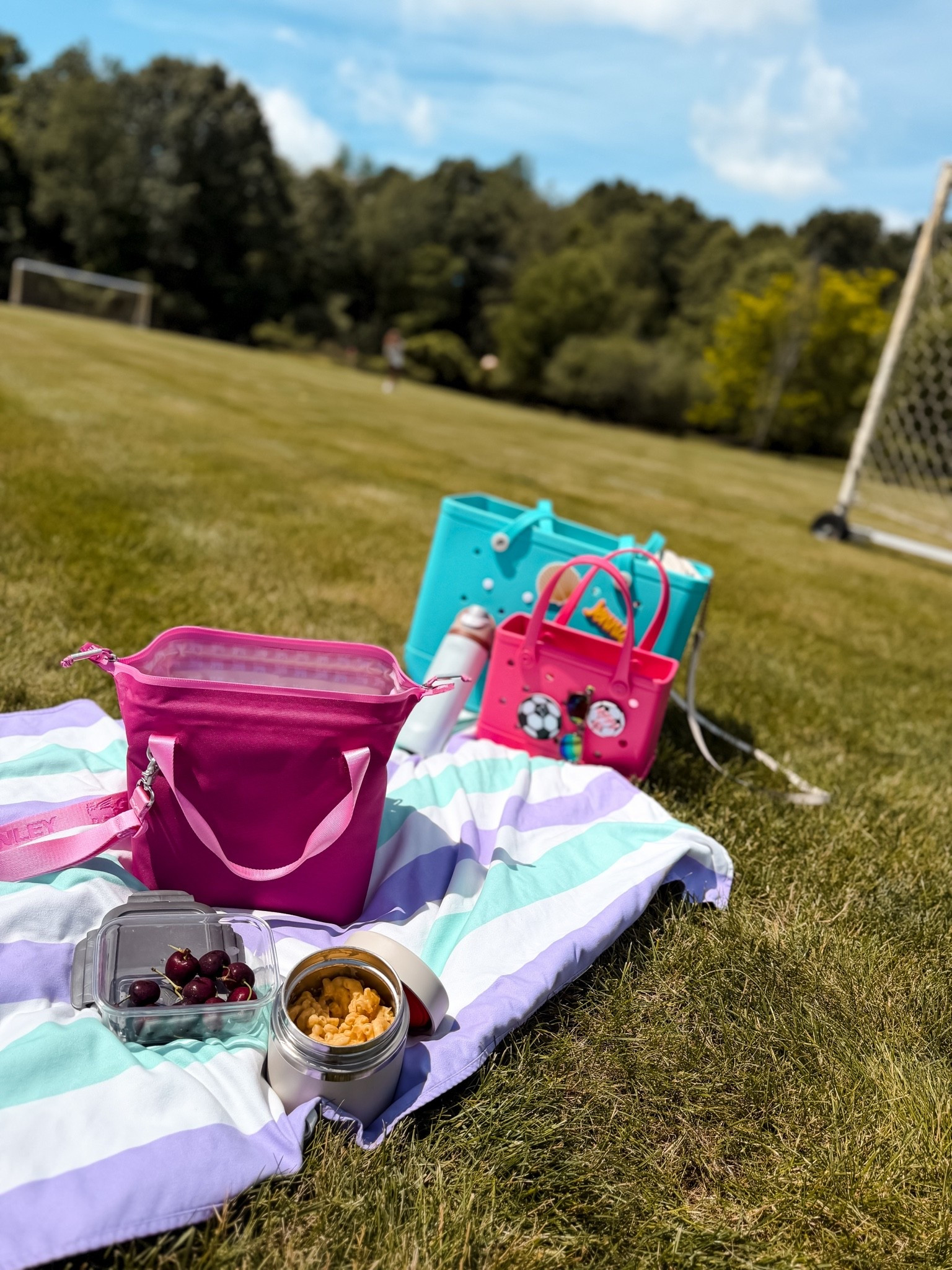 Summer mom in the go essentials 
Soccer mom
And sports parents must haves
Bogg bag and Stanley cooler