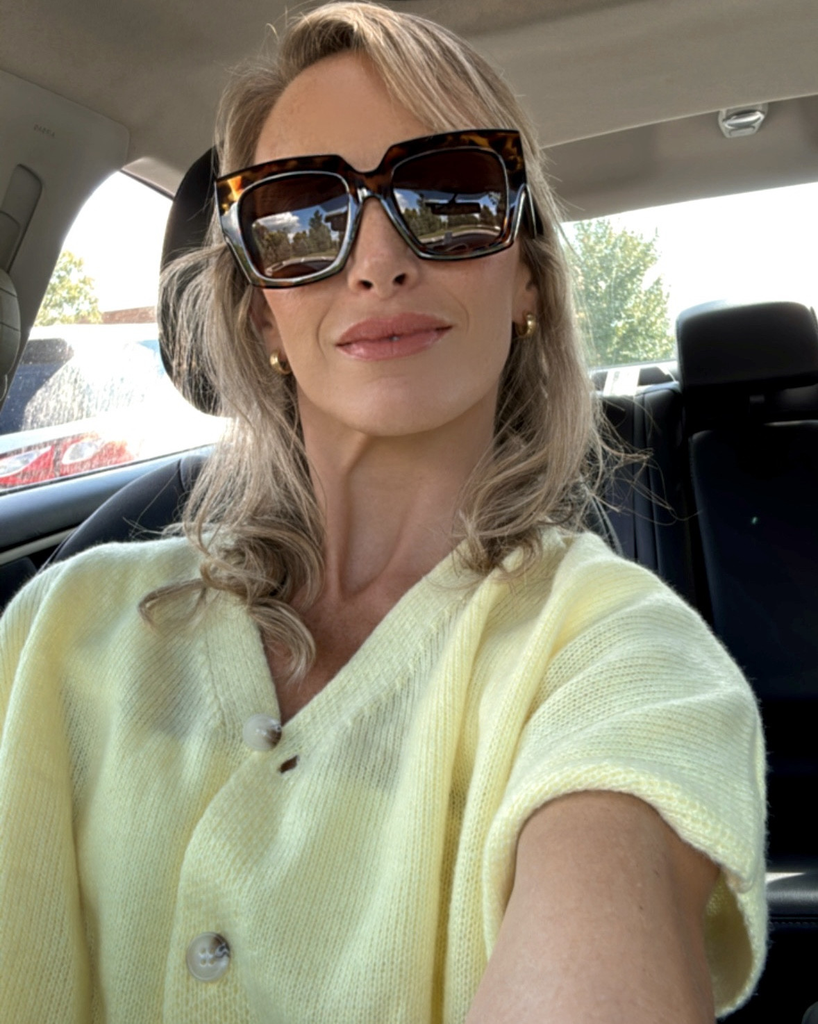 Obsessed with Buttery Yellow everything! 🌼

Especially loving this cute short sleeve yellow cardigan to transition from Summer to Fall ! Wear it alone with jeans, or throw it on layered over a dress!

My lipstick is under $10 & is a great DUPE for the viral ‘Pillow Talk’ by Charlotte Tilbury 💄 
YOU’RE WELCOME! 💁🏼‍♀️

Oh & check out my movie star ‘Marley’ sunnies by Ryan Simkhai 😎.  (sold out so I tagged similar ones)

.
.
summer outfits
oversized sunglasses 
Designer-Inspired Outfit
Travel Outfits
Luxe look for less
#OOTD #SummerOutfit #designerlooksforless

#LTKBeauty #LTKootd #LTKgrwm