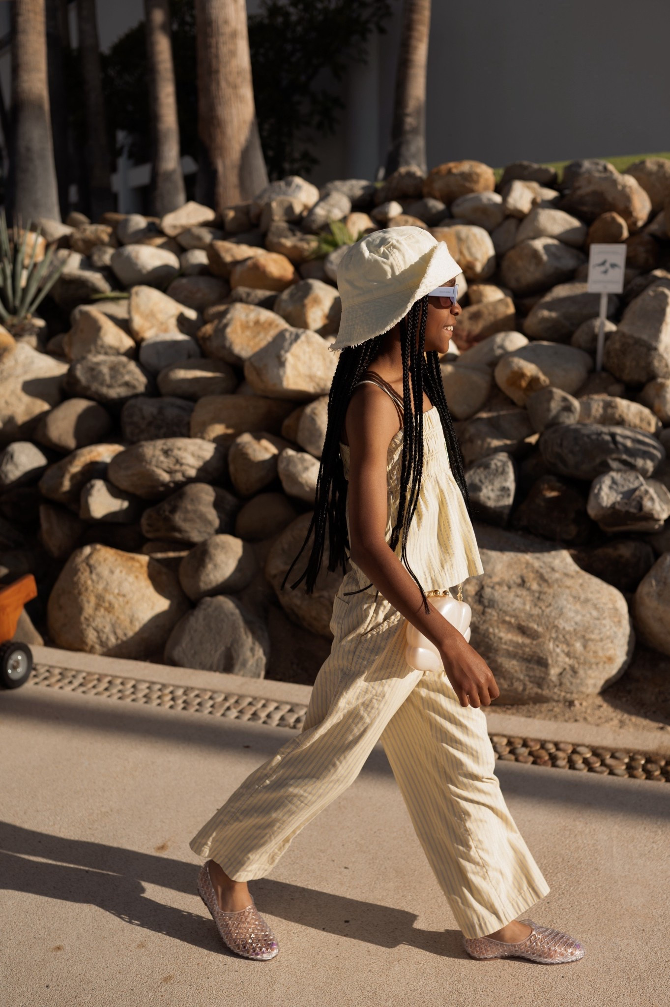 Kids spring break vacation jelly flats and yellow bucket hat  

#LTKTravel #LTKKids #LTKootd