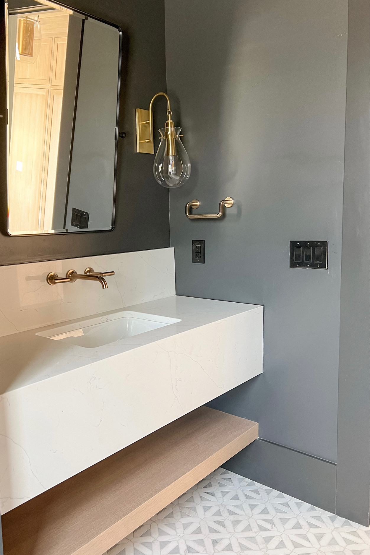 Powder bathroom sources and details. This is Iron Ore by SHERWIN Williams. The towel holders are Brizo. Linking similar towel holders.

#LTKstyletip #LTKFind #LTKhome