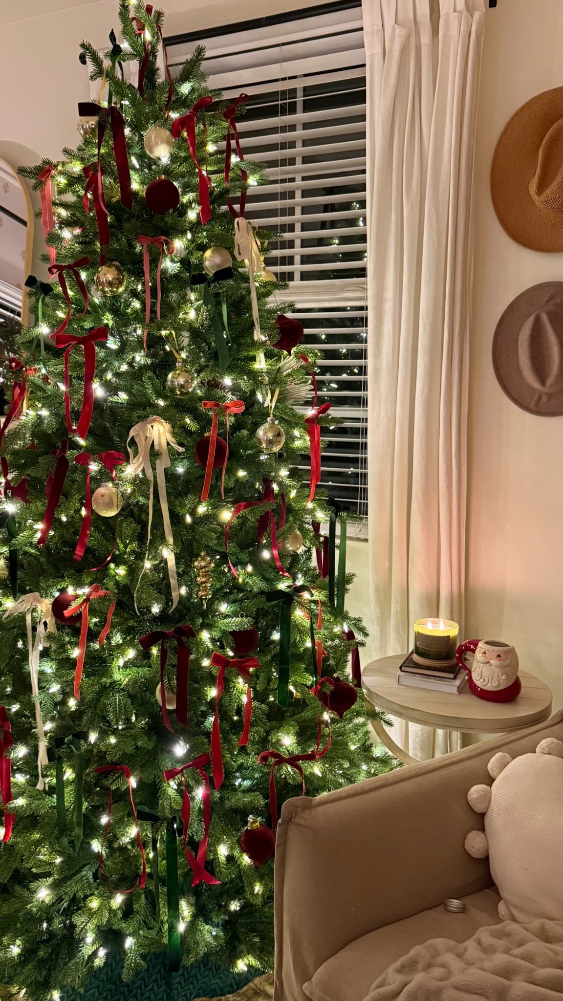 One of the most beautiful Christmas trees I’ve ever owned! And I’ve owned a lot! 
It has it all! This is a Princeton Fraser Fir. It has the power connect pole, so no searching for multiple light cords 🙌🏻 and 10 different light settings! And the colored setting is the good, vintage-feeling warm colored bulbs (with the pink!) The lights can twinkle, flash, fade and more. 

Feel real branches that are easy to shape. 10/10 quality and absolutely stunning! 

Be sure to also grab their gorgeous, full, pre-lit garland, a beautiful tree skirt; and some Scentsicles! White winter fir is my favorite!  

Christmas Home Decor | Holiday Home decor | Ribbon | Seasonal decor | National Tree company | Cozy Christmas Home | Christmas bedroom  | pre-lit tree | prelit | vintage colored bulbs 

#LTKU #LTKSeasonal #LTKHoliday