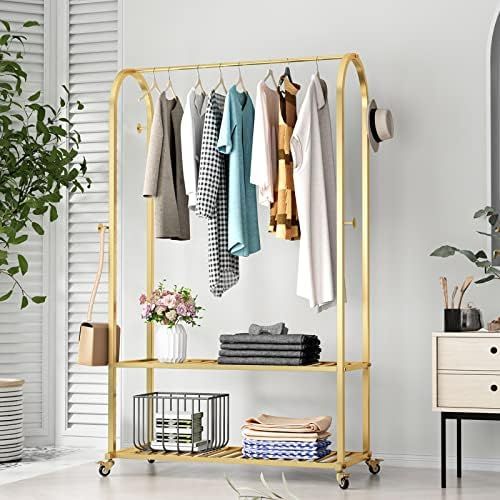 Modern Clothing Rack on Wheels Gold Display Rack with 2-tier Shelf Metal Hanging Rack Gold Clothes R | Amazon (US)