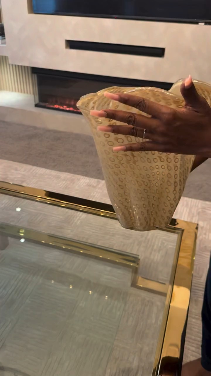 These new décor pieces are giving modern luxury with an artistic touch. 🤎 The sculptural Crush Gold Bowl and gorgeous Elle Glass Vase in Tawny from @zgallerie are statement pieces that can instantly elevate a coffee table, console, or dining space.

Which Z Gallerie piece is your favorite? 🤎 Comment LINK and I’ll send you the details! ✨

#ZGallerie #ZGallerieStyle #HomeDecor #LuxuryHomeDecor #ModernDecor InteriorStyling HomeDecorInspo NeutralHomeDecor DecorInspo CoffeeTableDecor ConsoleTableDecor DesignerInspired HomeStyling StatementDecor