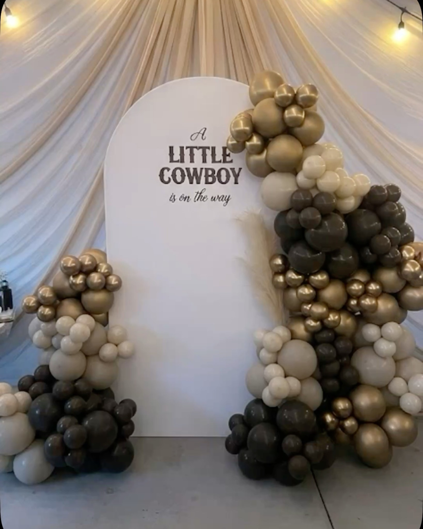 A cowboy is one the way western balloon backdrop 