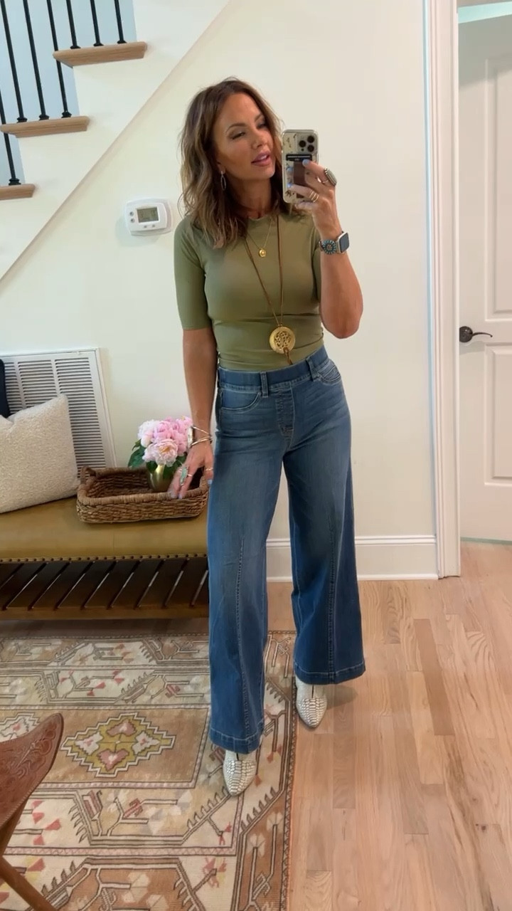 Spanx Suit Yourself Ribbed Crew Neck Short Sleeve Bodysuit, I’m in a medium, TTS! Paired with the Seamed Front Wide Leg Jeans, medium and regular length. Code BETSYXSPANX works! ❤️
Long necklace from @twistedsilver (code BETSY). Watch band from @copperrobin (try code BETSY). Other jewelry from @goldielew_ linked, code BETSY works! ❤️ Boots from Freebird linked! 

#LTKFind #LTKGiftGuide #LTKstyletip