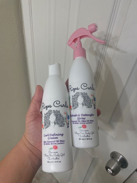 The curls have been crying for a new product and Rizos Curls definitely hit the spot!  Not only does it smell delicious, but it doesn’t leave any residue or make your curls crunchy.

Definitely worth every penny as it’s a little pricier than Mielle or Shea Moisture!  We use the detangling spray on semi wet hair to brush out the curls, followed by the curl defining cream right after for some curl pop. You can find these products at Ulta and Target.

#CurlyHairProducts #CurlyHair #TexturedHair #RizosCurls 

#LTKfindsunder100 #LTKfindsunder50 #LTKstyletip