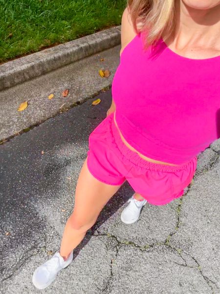 Hot pink cropped, work out tank, high waisted, pink, running shorts, Brooks sneakers. Wearing an extra small in the shorts and top.

#LTKSeasonal #LTKunder50 #LTKFind