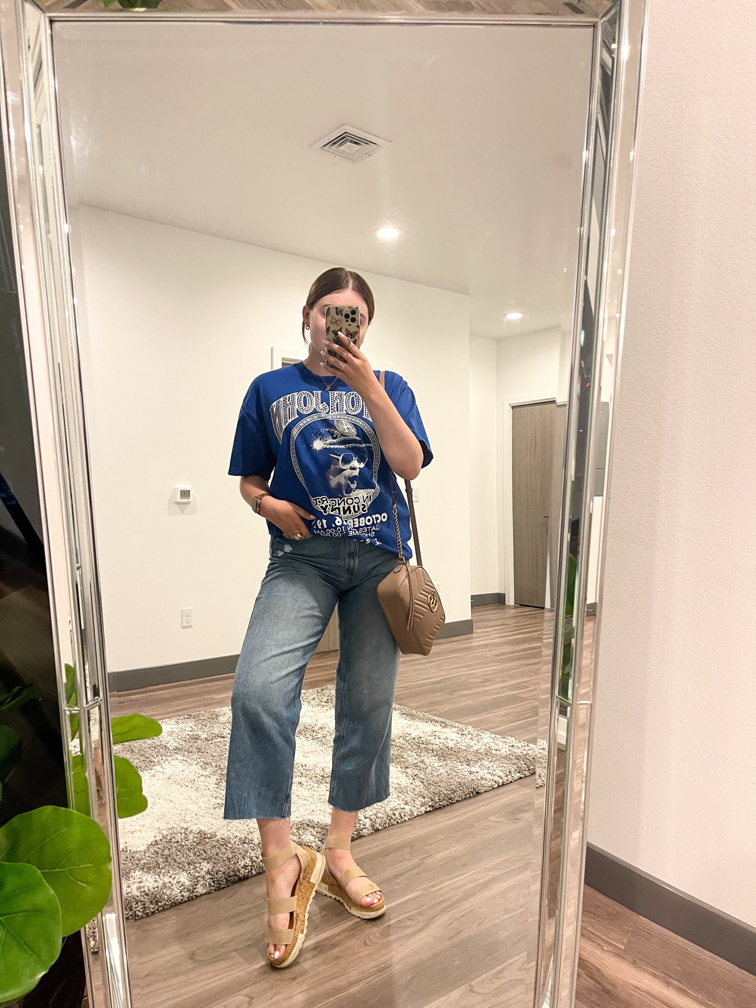 Casual going out outfit idea for fall! Featuring an oversized band tee and wide leg jeans 

I’m wearing size L/XL tee, size 31 jeans and size 9 sandals 

#LTKSeasonal #LTKstyletip #LTKunder100