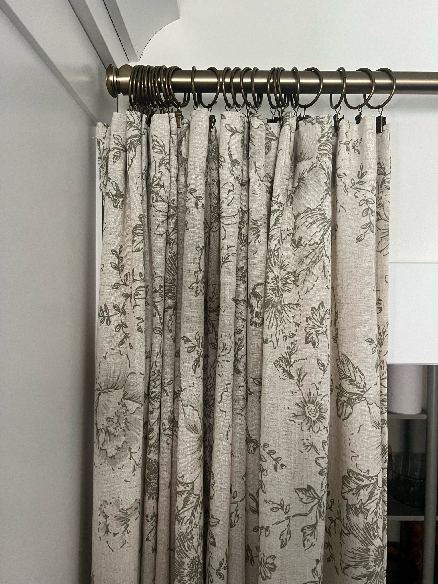 New favorite curtain rod for real. The finish is such a good antique brass look and the price is right.
Love these curtain rings too, and the linen floral/toile look drapes 

#LTKfindsunder50 #LTKhome