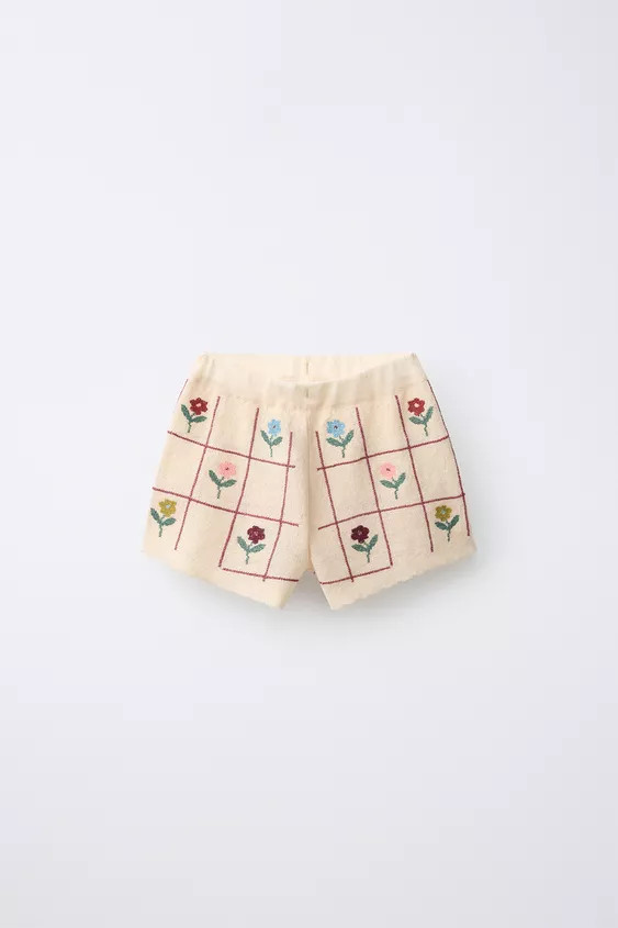 Knit Bermuda shorts with an elastic waistband and a floral print. | Zara UK