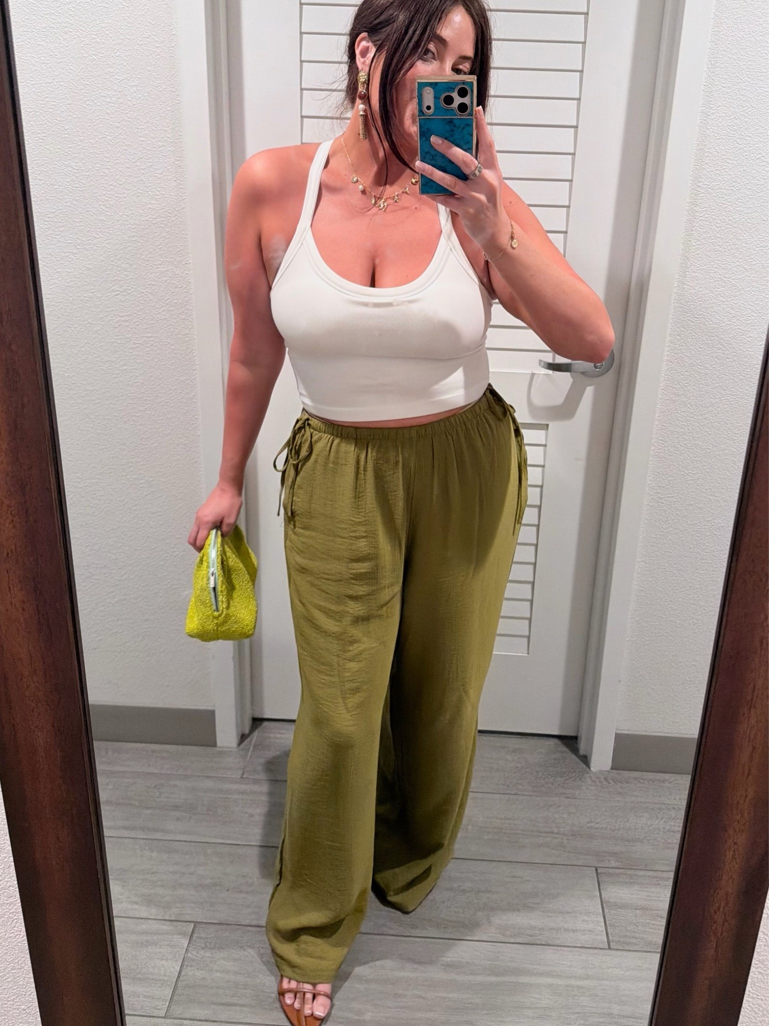 These pants are 10/10. I would definitely recommend taking your true size and if between, size down unless you want a very loose fit. A few color options but this green 🤌

Tank is also Target and is sooo good. Braless! And of course, Courtney Grow’s Reformation bag