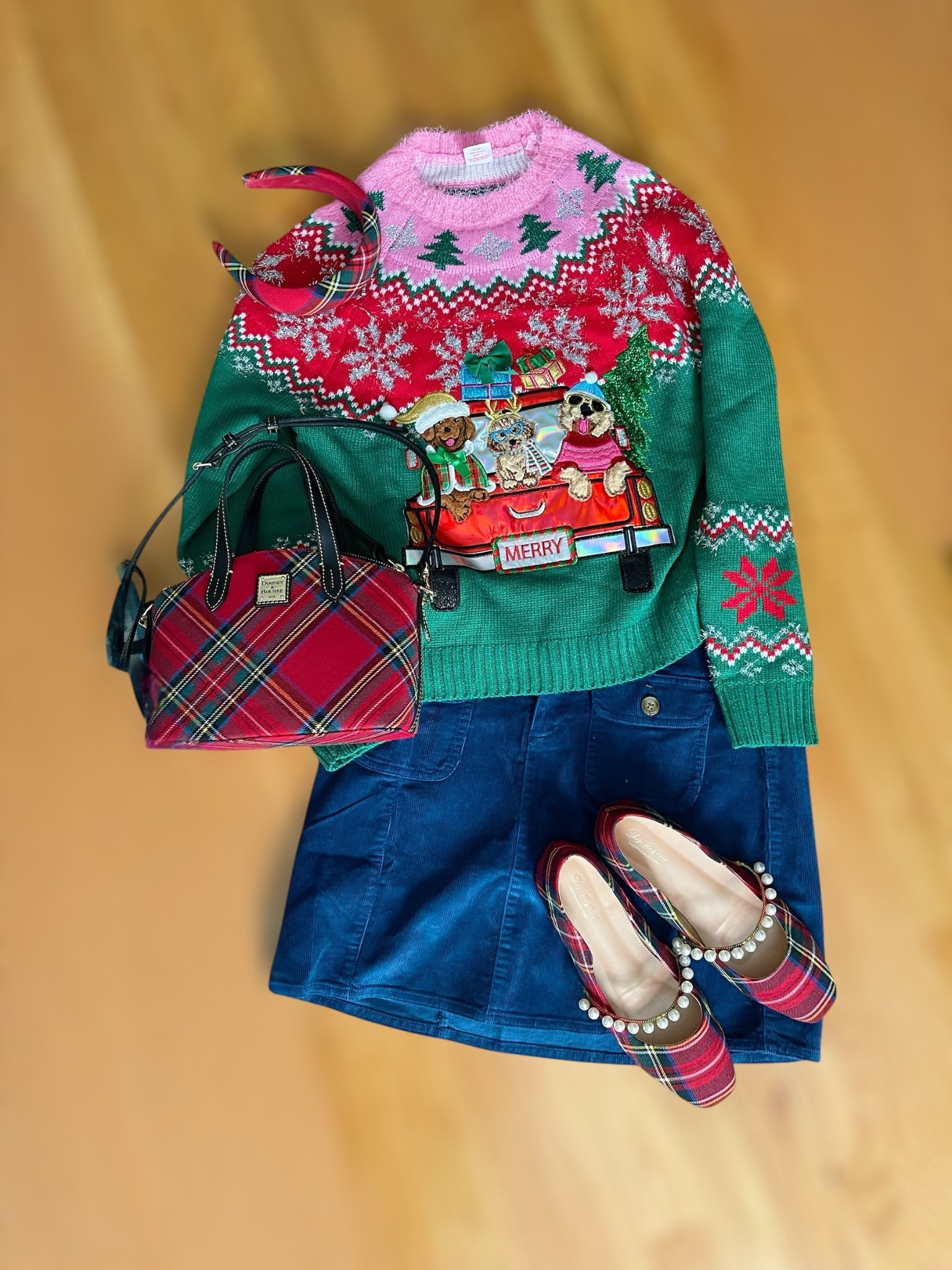 Festive & Fun Christmas Sweater Outfit 🎄💗✨

The cutest holiday outfit combo! This embellished Christmas sweater is pure MERRY — bright colors, playful details, and so perfect for parties, spirit days, or cozy December outings. I paired it with a J.Crew Factory corduroy mini skirt for that classic winter texture and added all the tartan touches: a plaid padded headband, a Dooney & Bourke tartan bag, and the sweetest pearl-trim tartan flats. It’s cheerful, whimsical, and totally ready for every holiday moment. ❤️💚

christmas sweater outfit • festive holiday look • embellished christmas sweater • corduroy skirt outfit • tartan accessories • plaid holiday flats • dooney & bourke tartan • holiday outfit ideas • merry christmas style • winter skirt outfit • holiday fashion inspo • colorful christmas style

#LTKHoliday #LTKFindsUnder50 #LTKFindsUnder100
