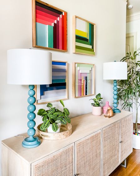 Colorful art, blue lamps, ball lamps, cane console table, geometric art, color block art, spring decor, colorful home decor, table lamps 

#LTKhome #LTKSeasonal #LTKFind