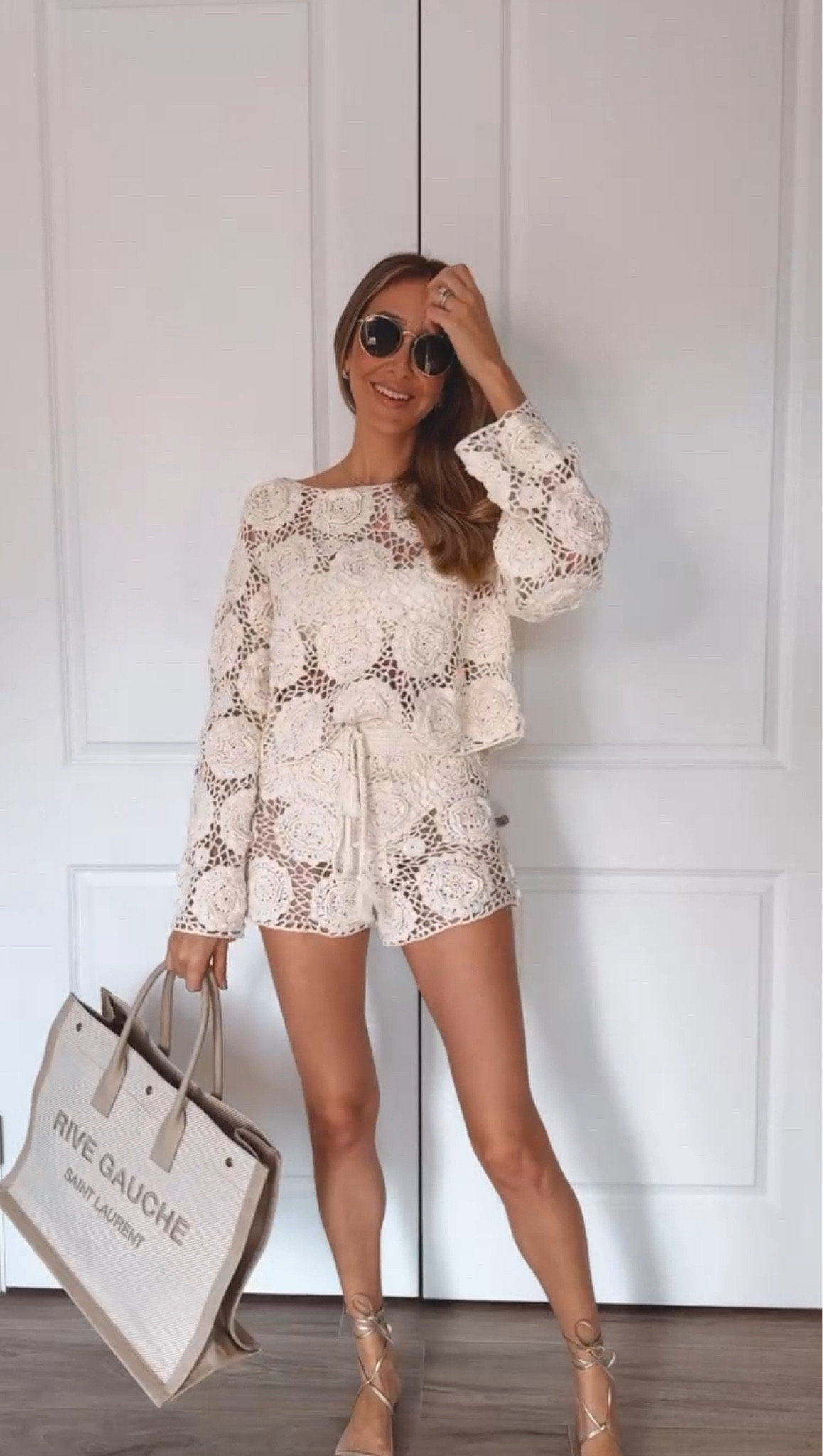 Gorgeous vacation outfits. 
Cover ups edition.
This crochet cover up set from Revolve is so chic and feminine. I love this two-piece swimsuit, also from Revolve. The belt detail makes it so elegant and stylish. I love this beige rive gauche tote.
These sandals from Amazon are so chic and I love the quality🙌🏻
Everything fits true to size
Wearing size small

#LTKitbag #LTKstyletip #LTKswim