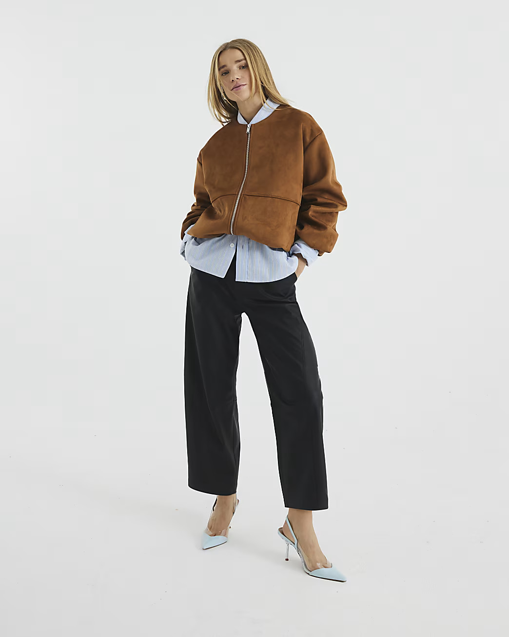 Black Faux Leather Barrel Leg Trousers | River Island UK & IE