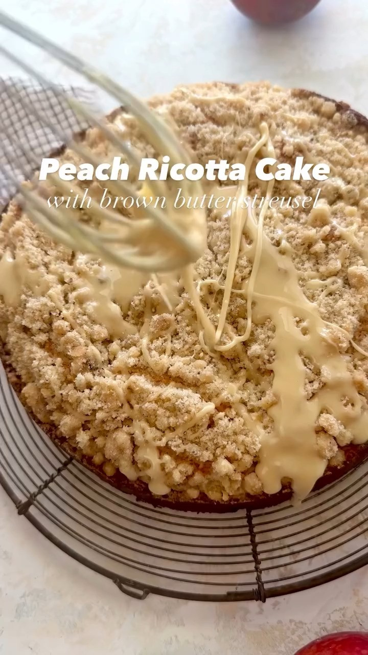PEACH RICOTTA CAKE

This Peach Ricotta Cake is soft, moist, and packed with juicy peaches. Topped with a nutty brown butter streusel and a sweet honey glaze, it’s the ultimate summer treat! Serve it for brunch, dessert, or a cozy coffee break.🍑 Full recipe on my blog: https://www.twopeasandtheirpod.com/peach-ricotta-cake/ 

 #LTKHome #LTKFindsUnder50 #LTKFindsUnder100