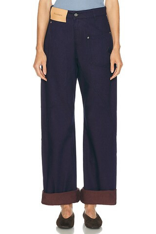JW Anderson Turn Up Twisted Leg in Blue & Red - Blue. Size 24 (also in ). | FWRD 